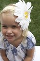 Let your little girl have fun in the sun in a Gigis baby yellow and white daisy Sunday Headband.