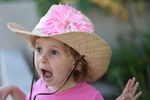 Girls on the ranch still want to be pretty in pink! So on her first trip to the corral, grab her Pink Cowgirl hat.