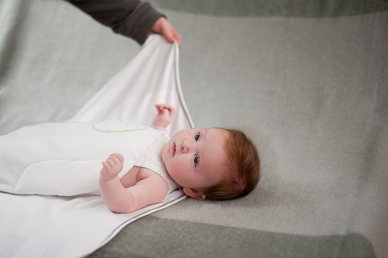baby arm comes out of zen swaddle