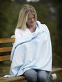 SwaddleDesigns multi-use swaddling blanket can be used as a privacy throw, sun shield or play mat!