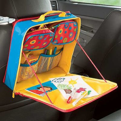 A fold-out desk that attaches the headrest of the front seat