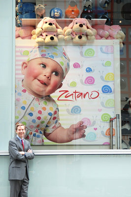 Jeremy Richardson standing in front of client Zutano's windows in NYC