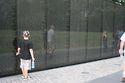 Austin walking along the Vietnam Memorial 